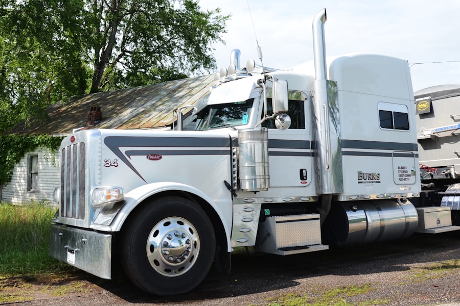 American Peterbilt semi at sunset — trucking insurance (TRUCKER SECURE™)